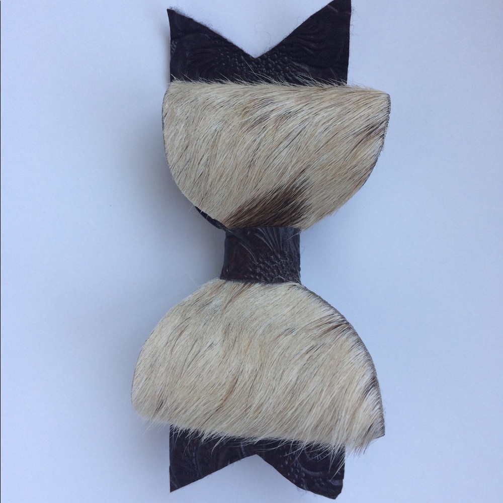 Genuine hair on cowhide hair bow